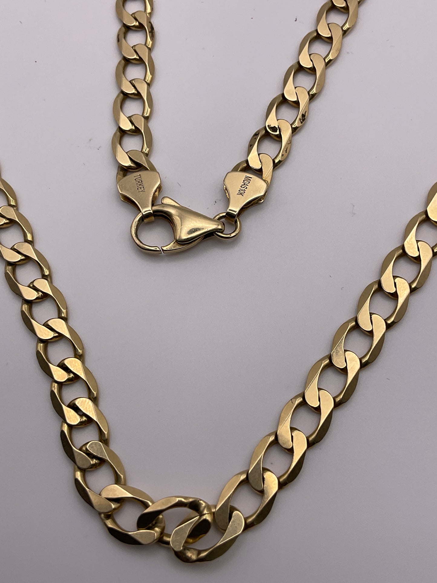 27.2g 10k Yellow Gold Chain, 20in, 7mm, Beveled Curb Link