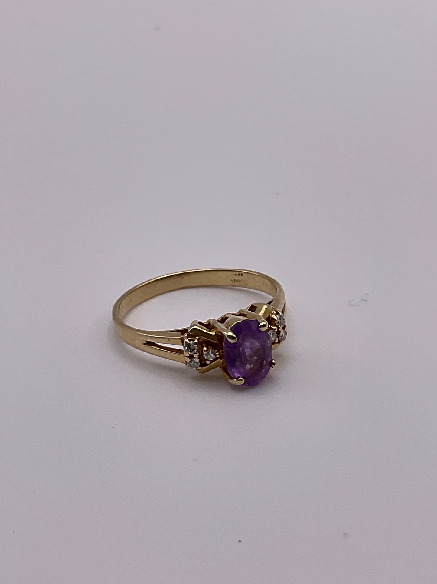 2.0g 14k Yellow Gold Diamond/ Purple Ring size 6